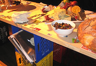 The tabletops for the buffet stations were recycled wooden doors covered with rock-and-roll stickers and held up by milk crates filled with vinyl records.