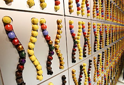 Ninety Nespresso dispensers filled with a multicolored selection of 1,980 capsules made for a unique—and brand-appropriate—wall installation.