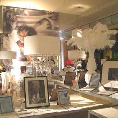 Feathered arrangements in urns helped spruce up the silent auction tables.