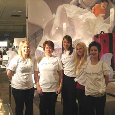 Volunteers wore matching T-shirts and white angel wings.