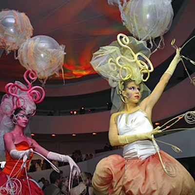 At the end of the night, two whimsically dressed dancers from Alice Farley Dance Theater donned stilts and danced and weaved through the masses.