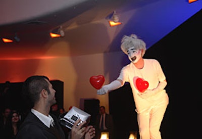 Performance artist Ryan Styles charmed guests with balloon tricks and mime work.