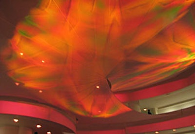 Lighting company JKLD lit the overhead scrim with colorful abstract projections inspired by Rist’s video creations.
