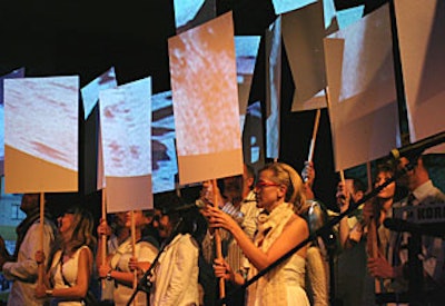 It was fitting that the event—held a week before the national elections—included a reenactment of Anna Halprin’s 1967 “Blank Sign Protest March” (originally a piece in which the artist walked around the city with blank signs, letting the public write out their own messages of protest). This time, the blank signs doubled as screens for video projections.