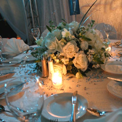 White rose centerpieces, votive candles embossed with the evening's slogan 'Hope for All,' and gleaming crystals strewn around the tables gave the evening's its 'diamond' side.