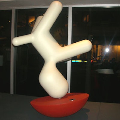 Konstantin Grcic's Nose-Jive-Three-Sixty, one of the eight puppies selected for the auction, featured a puppy having some upside-down fun, playing with his ball.