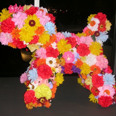 This dog that was covered head-to-toe in various-colored flowers was not one of the pups selected for auction.