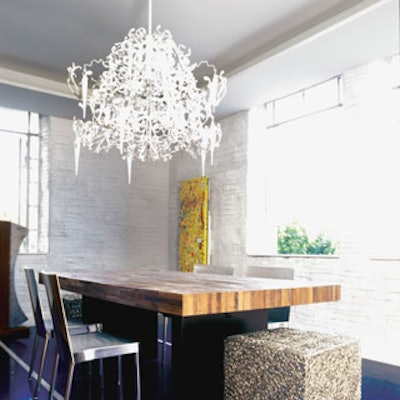 Also on the second floor was Christopher Raessler's (South Beach Design Group) creation, titled Vita Versus. The ornate chandelier was the focal point, but the use of metallic cubes as seating for the dining table garnered just as much attention.