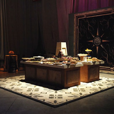 The cocktail reception featured appetizers served on tables specially designed by Barton G.