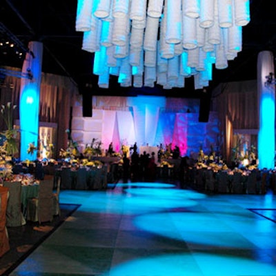 White tubing provided by Barton G. hung from the ceiling and was accented with blue lighting, making for a unique touch above the dance floor.