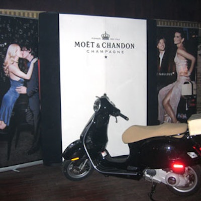 Floor-to-ceiling posters with images from Mo?t's ad campaign were propped up everywhere.