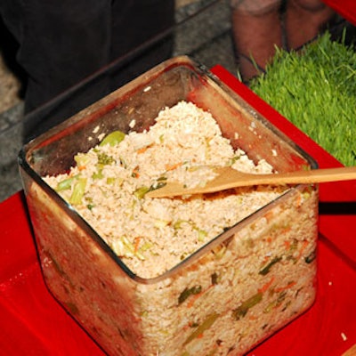 Guests were served Teriyaki rice and vegetable salad from large square vases.
