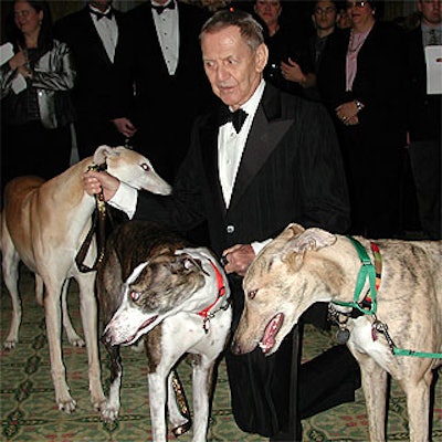 Tony Randall posed with greyhounds Rue Rue, Atlas and Samantha upon his arrival to the Bide-a-Wee Have a Heart gala dinner dance at the Pierre.