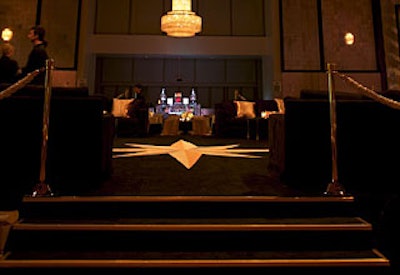 An elevated V.I.P. area in the center of the party space resembled a boxing ring.
