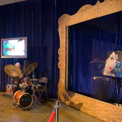 Artist Monique Richard stood behind a seven-by-nine-foot gilded picture frame while painting on a small easel-mounted canvas during KPMG's annual Winterfest party at the Metro Toronto Convention Centre.