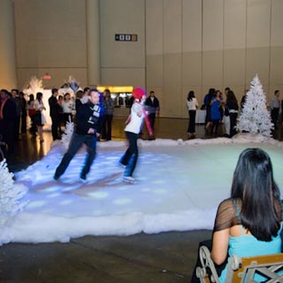 Ice skating duo Lisa and Kent Grice performed on a faux ice surface.