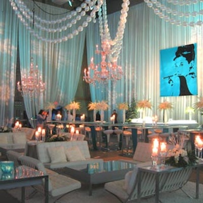 Lounges and long, high tables with tall floral centerpieces from Signature Rentals furnished the cocktail space.
