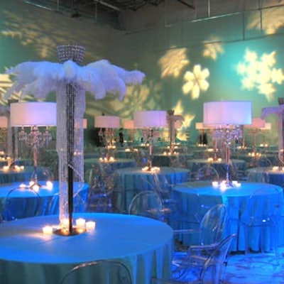 White snowflake gobos decorated blue-lit walls in the dining room.