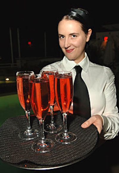 A “Biolage Leading Lady” specialty drink combined cava and cranberry juice.