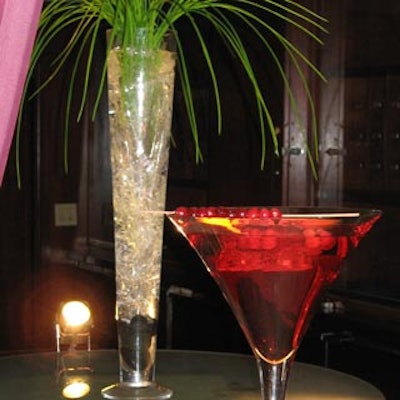 Martini glasses filled with a red-current based liquid and clear, tall vases filled with bright green palm fronds helped create a chic holiday season atmosphere at the Metropolitan for the hotel's annual staff party.