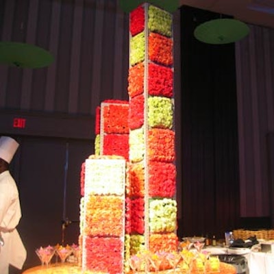 Stacks of carnation-covered cubes depicted summer.