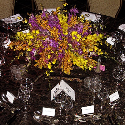 The stunning floral arrangements by Salou Design lit up the room with an array of pink, yellow, purple and white flowers.