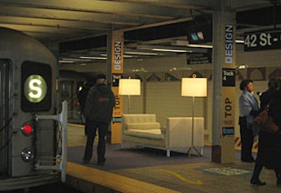 Commuters stopped to check out the displays as they boarded shuttle trains to Times Square.