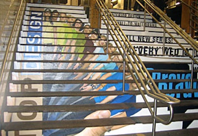 Colorful adhesive signage included images of the contestants that covered an entire flight of stairs.
