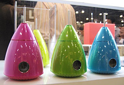 This mod, space-age number is a digital clock-radio from Lexon. Turn it on or off by rotating the antenna, and change the frequency by turning the base. It's available in six shiny colors perfect for brightening up a desk; the suggested retail price is $55.