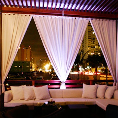 Using Party Depot rentals, event planner John Rossetti set-up beautiful white cabanas for guests to relax on.