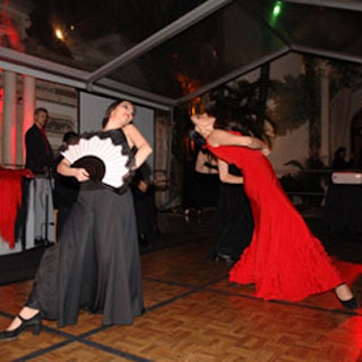 Three women from an internationally acclaimed Flamenco troupe performed dance numbers at various points throughout the event, at times using hand-held matching fans as props.