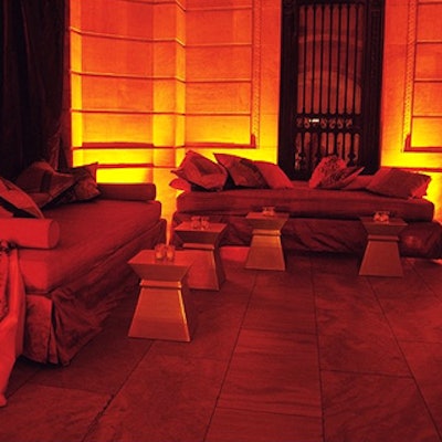 Musters & Company prepared luxurious lounge areas in the bold red tones that he used for all of the decor for the Hannibal premiere party.
