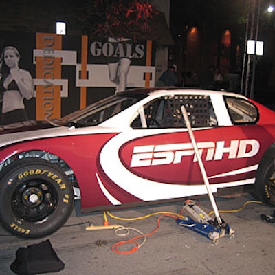 At the Nascar Pit Crew Challenge at the block party, guests learned how to quickly service Richard Petty's racing car alongside a real crew team.