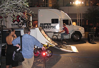 Professional BMX bikers performed X Games-esque bike stunts on a mini-half pipe.