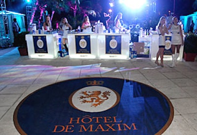 A blue carpet showed the party's logo.