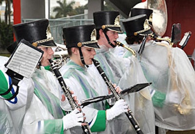 ESPN got ready for the big day with a tailgate party that featured a performance by a Miami-area high school marching band.