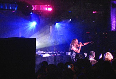 During the after-party, Eve performed on a stage at the northwest corner of the floor, blocking as little of the view as possible.