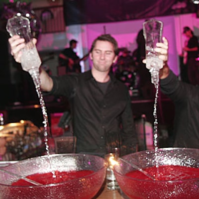 Bartenders spike the punch bowls at Hollywood Covered magazine's prom-theme promotional event.
