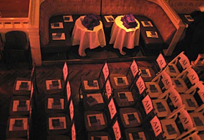Seating arrangements included tables at the built-in booths and wooden fold-up chairs down the center of the venue.