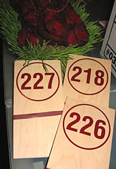 Guests used wooden paddles to bid on live auction items.