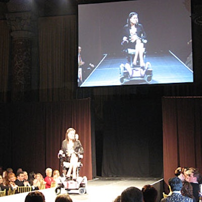 Honoree Michele Boardman modeled apparel and a custom-decorated chair from Baby Phat by Kimora Lee Simmons.