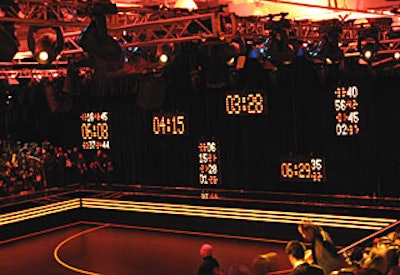 The scoreboardlike LED panels acted as a countdown to the show and later displayed motorcycle graphics. Programmable Versatube lights arranged in three stripes ran along the face of the catwalk.
