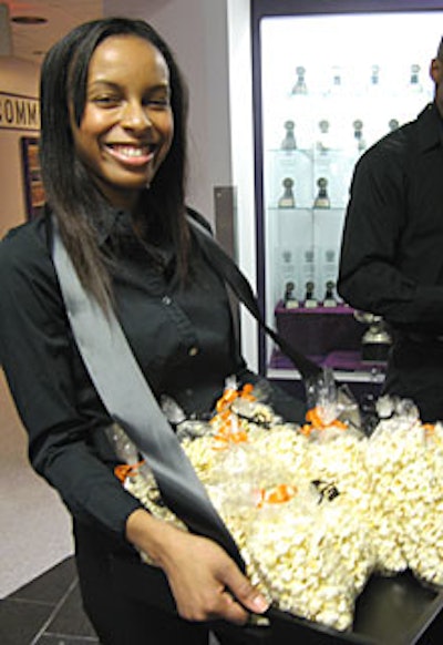 Many elements reminded guests of the location, including the food: popcorn and orange cocktails.