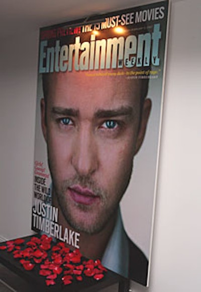 Tableaux showcasing Timbaland's artists (including Justin Timberlake) were created with blown-up magazine covers and photos set on tables strewn with rose petals.