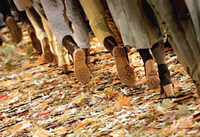 Models walked on a recessed runway filled with fireproof silk leaves that were attached to the catwalk (as well as strewn loosely on top).