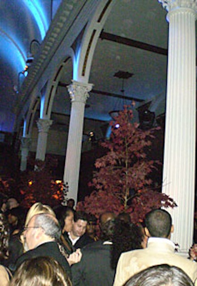 Life-like silk Japanese maple trees provided leafy decoration.
