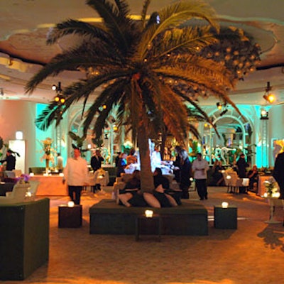 Although the threat of bad weather forced planners to move the party inside, four large artificial palm trees decorated the indoor event.