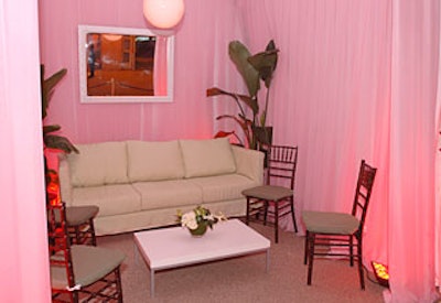 Felix Lighting designed the red uplighting used on the outdoor white cabanas to dramatic effect.
