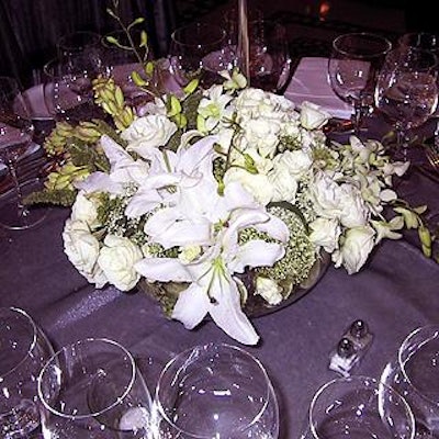 David Tutera's white and green centerpieces featured roses, orchids, tulips, lilies and bamboo.