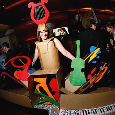 A grand piano bursting with instruments represented Bucharest’s classical George Enescu festival. Dan Mestanza, a Paris-based artist, created 23 costumes in 29 days in New York, after the 17 countries on parade selected the themes they wished to highlight.